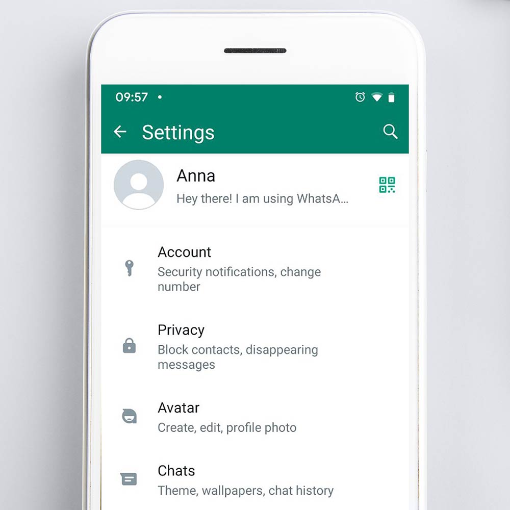 Screenshot of the user profile section in WhatsApp, highlighting the QR icon
